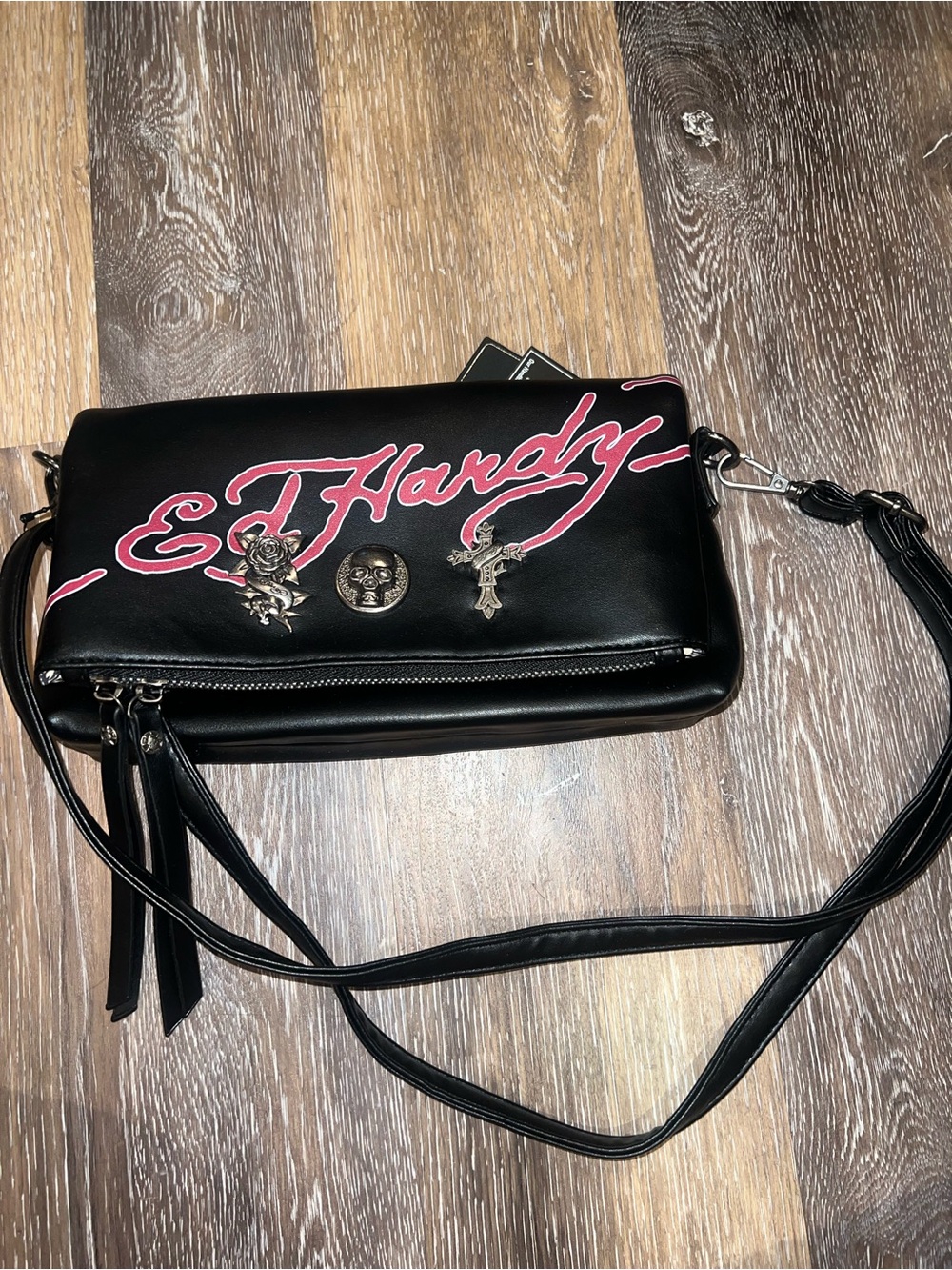 Ed Hardy Black Crossbody Bag with Pink Script and Metal Charms